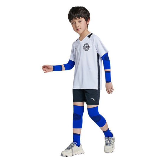 Child wearing blue kids sports protection sleeves for knees and elbows