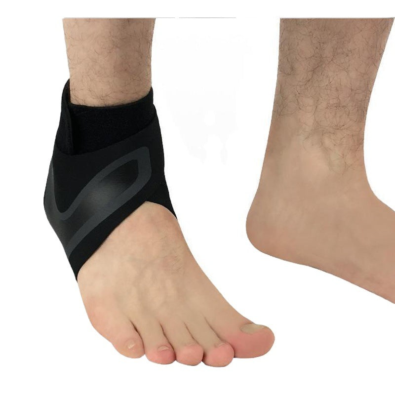 Black adjustable ankle brace worn on foot with open-toe wraparound support
