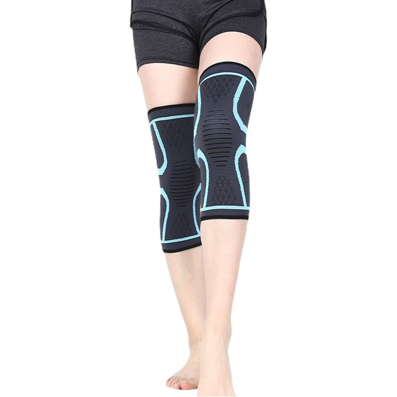 Black knitted knee support sleeve with light blue trim worn on legs