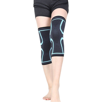 Black knitted knee support sleeve with light blue trim worn on legs