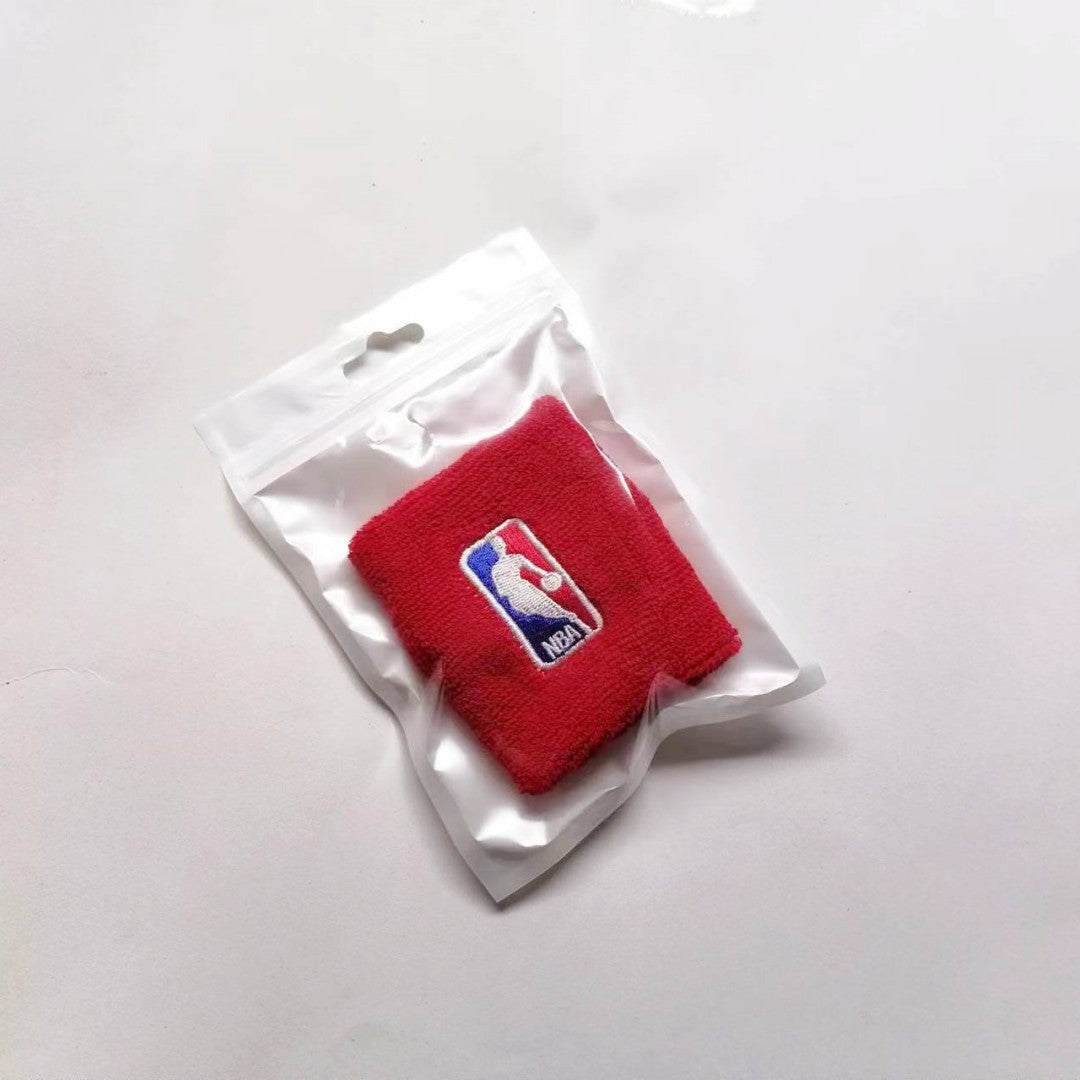 Two soft cotton wrist sweatbands with absorbent terry texture and sporty embroidery
