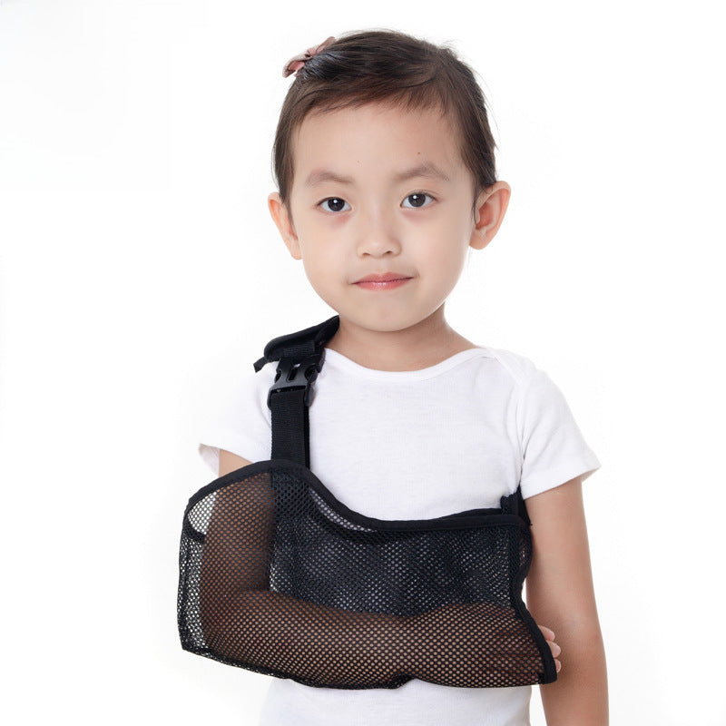 Side view of child wearing black arm sling with adjustable strap placement