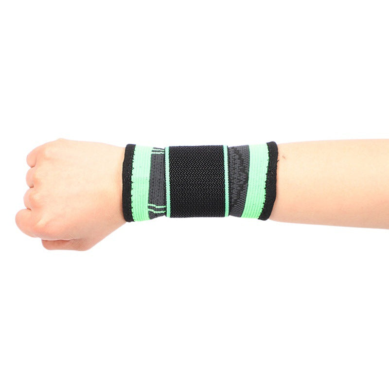 Black adjustable wrist support brace worn on wrist
