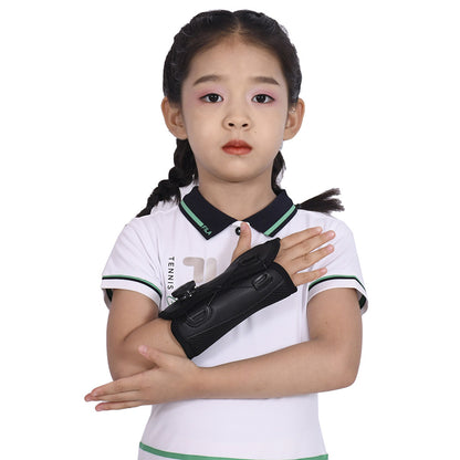 Gray pediatric wrist support brace with structured shape and adjustable straps