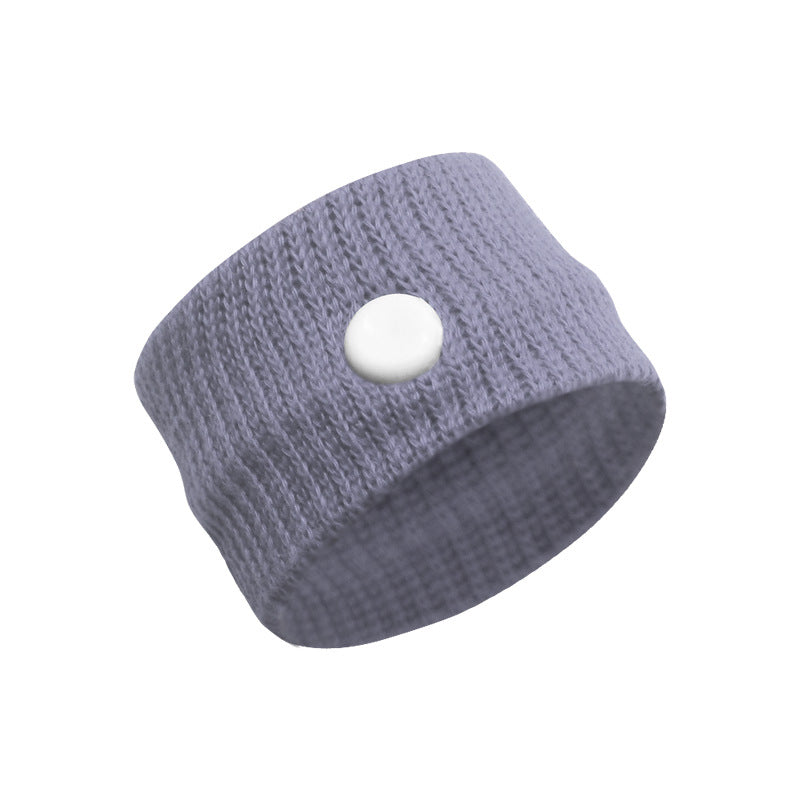 Two knit thumb wrist support bands in blue and green with patterned finish