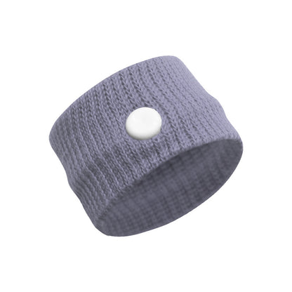 Two knit thumb wrist support bands in blue and green with patterned finish
