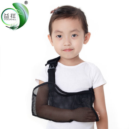 Child wearing black forearm sling support brace showing front fit and arm coverage