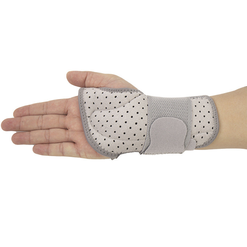 Back view of gray thumb wrist brace showing mesh fabric and wide wrist strap