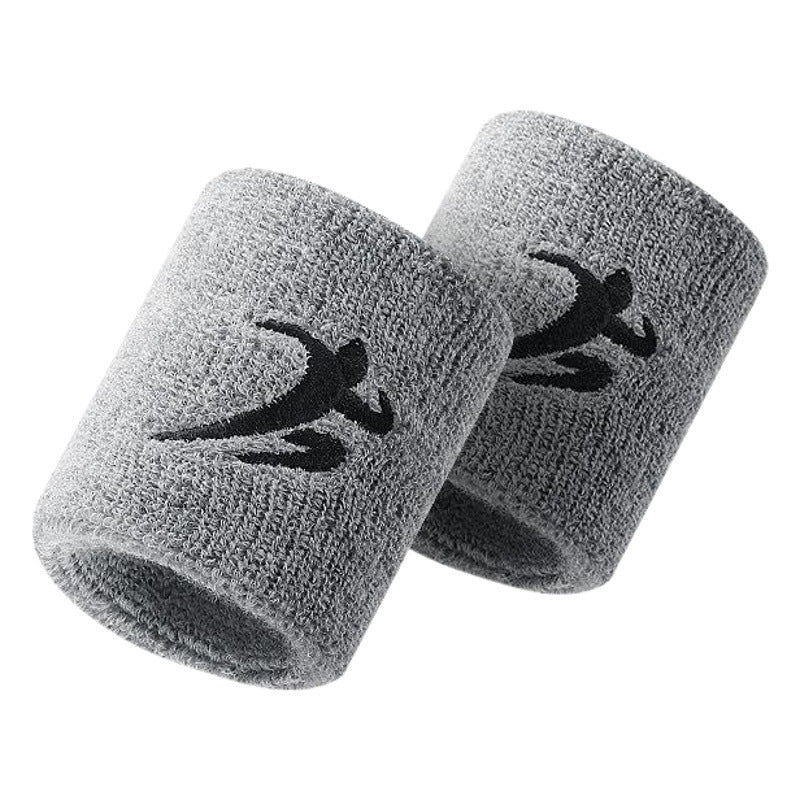 Grey wrist support sleeves shown from a different angle on white background