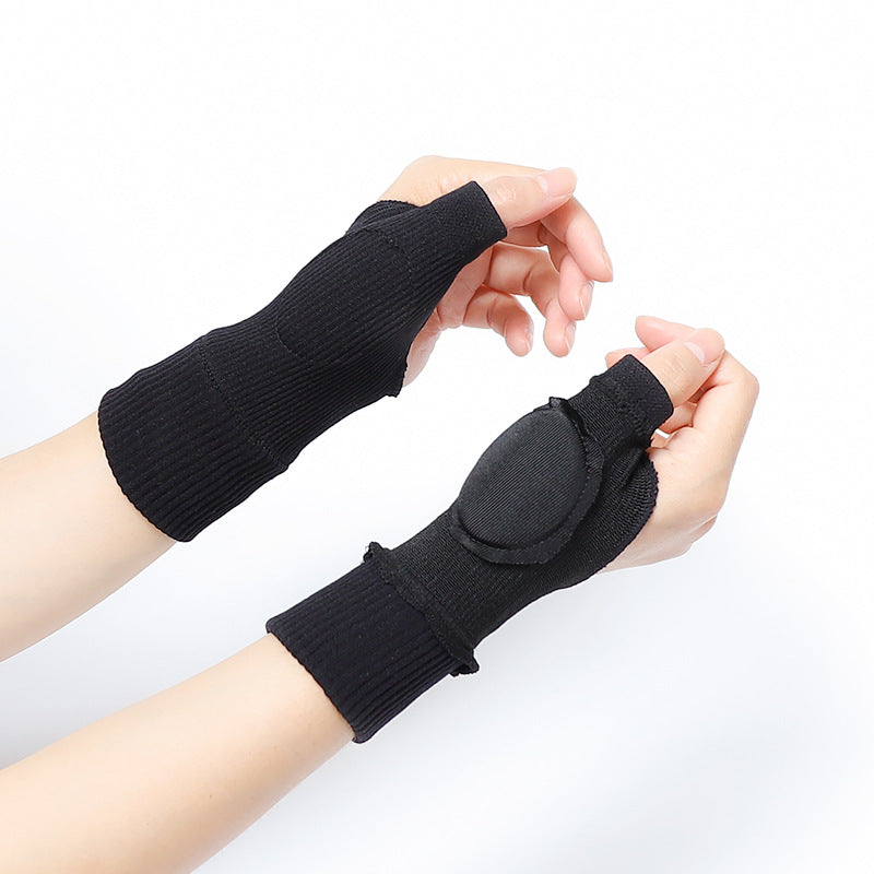 Stretchable black thumb support wrist brace showing flexible knit material