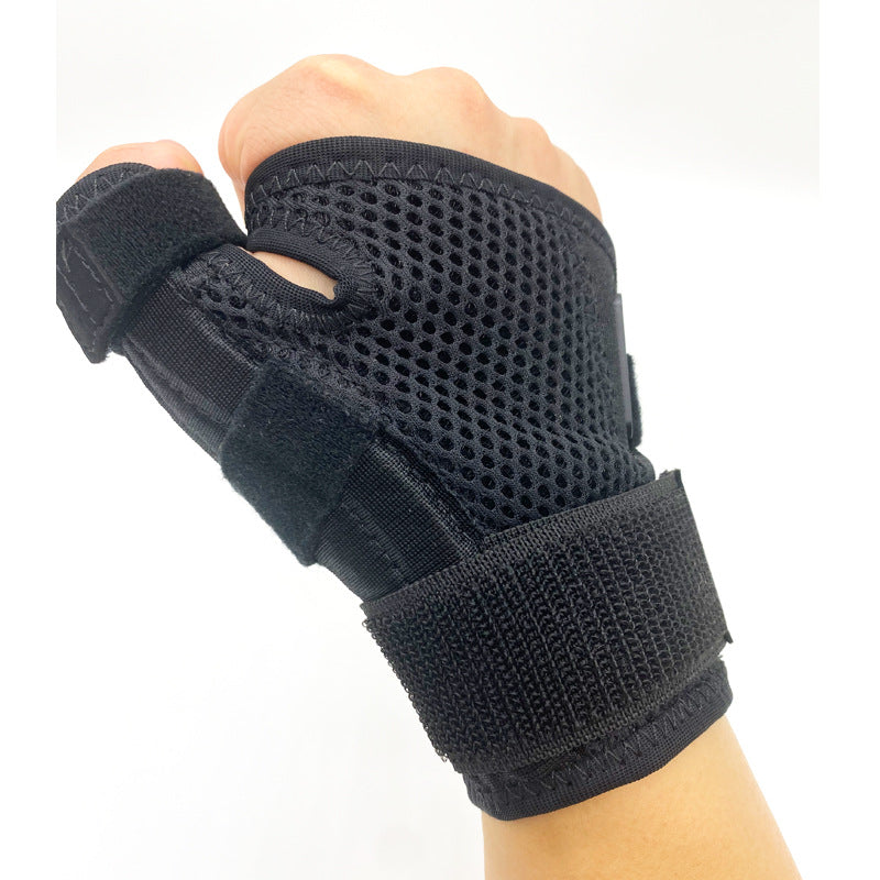 Close-up of black thumb wrist brace showing mesh texture and adjustable compression strap