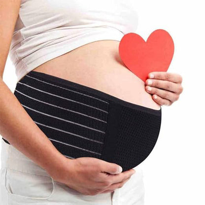 Black maternity belly support belt worn on model showing adjustable support band design