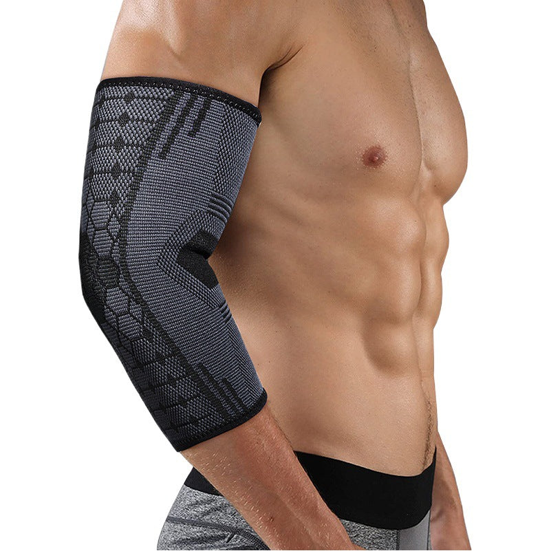 Black breathable elbow support sleeve worn on arm showing knit texture and close fit