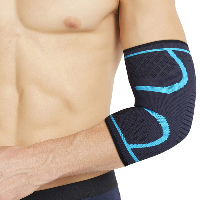 Adult wearing compression elbow sleeve with arm extended