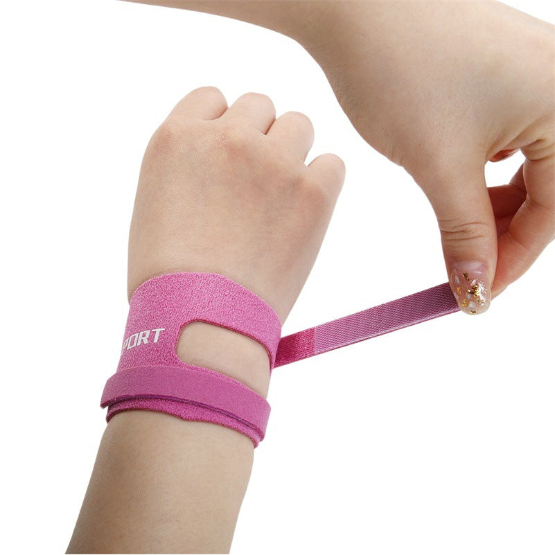 Left hand thumb wrist brace in black showing thumb opening and wrap design