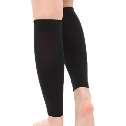 Black unisex calf support sleeves worn on both lower legs