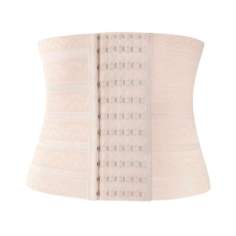 Black abdominal support band on model in alternate pose
