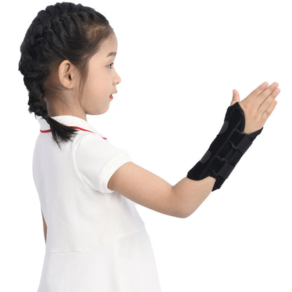 Side view of child wearing a black wrist and forearm support brace