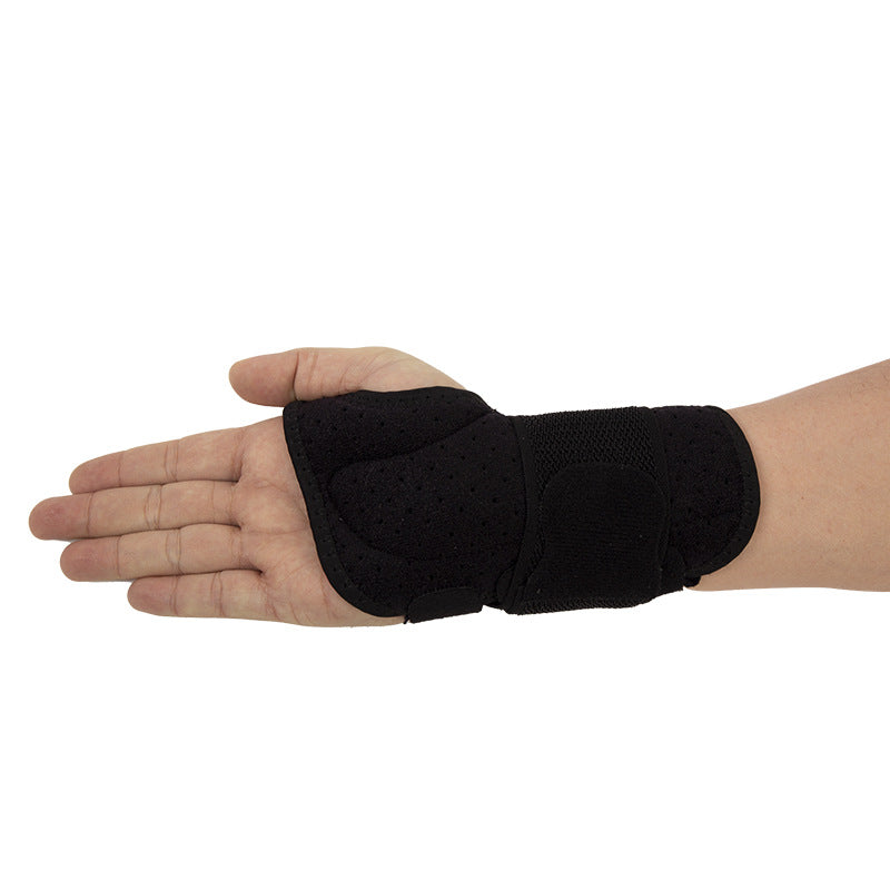 Gray thumb wrist brace worn on hand showing breathable perforated fabric and adjustable strap