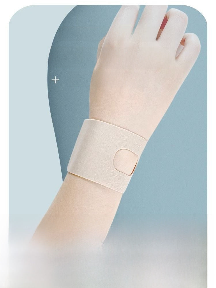 Nude thumb wrist brace sleeve worn on wrist showing slim everyday support design