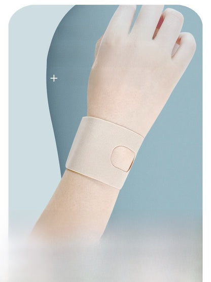 Nude thumb wrist brace sleeve worn on wrist showing slim everyday support design